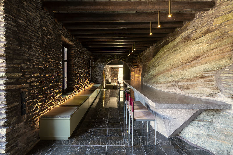 stone villa interior unique table built into rock