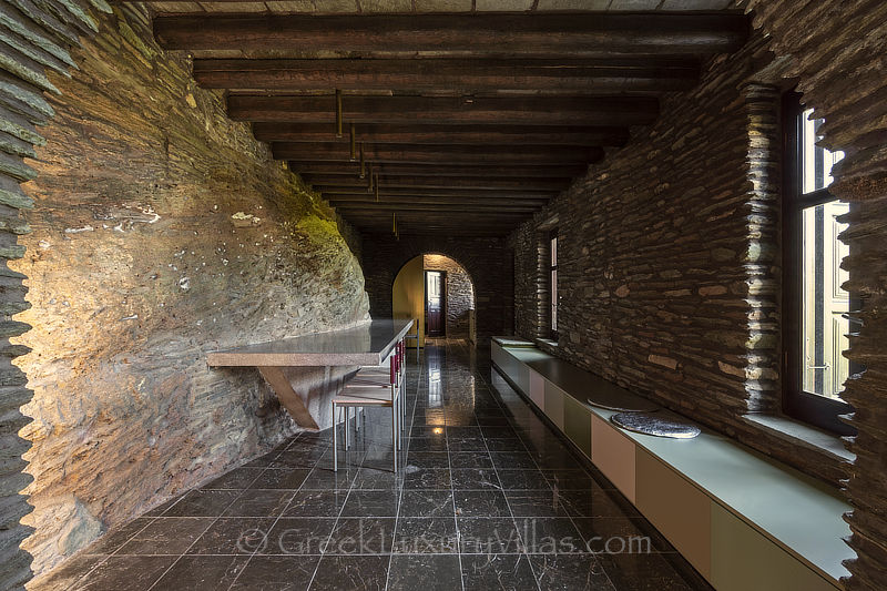 traditional stone villa modern dining area in Andros