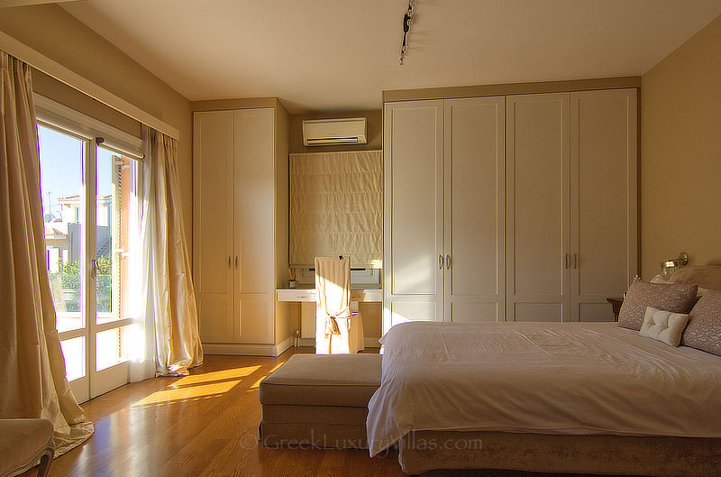 master bedroom luxury villa with pool near athens close to beach