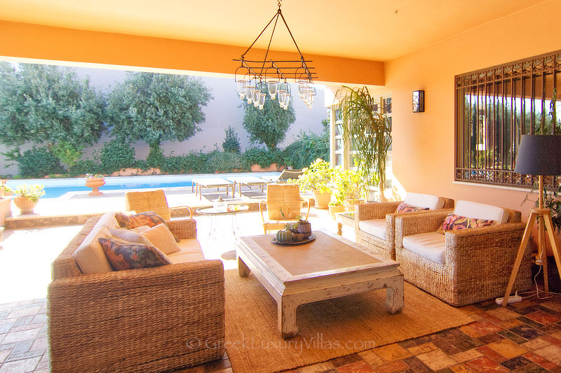 outdoor lounge at villa with pool near athens
