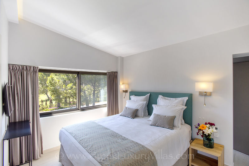 modern bedroom beachfront villa private island