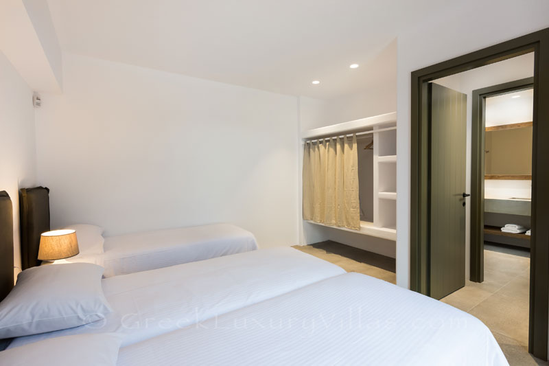 Triple room in the luxury beachfront villa