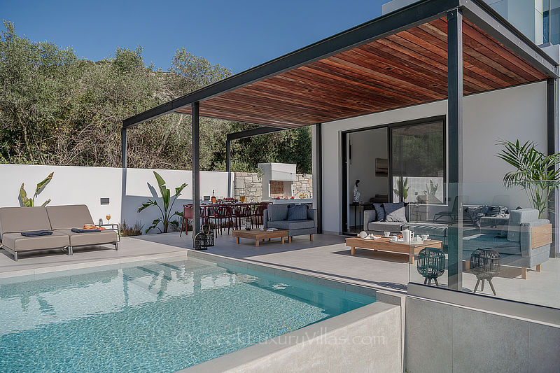 Outdoor lounge of luxury villa with pool