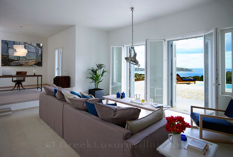 The lounge of a luxury villa with a pool in Elounda, Crete