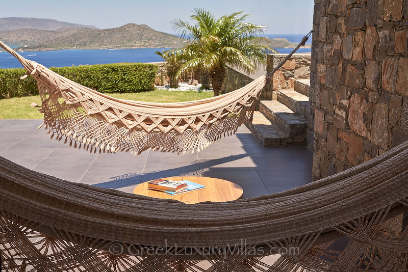 relax in our hammock overlooking elounda bay crete