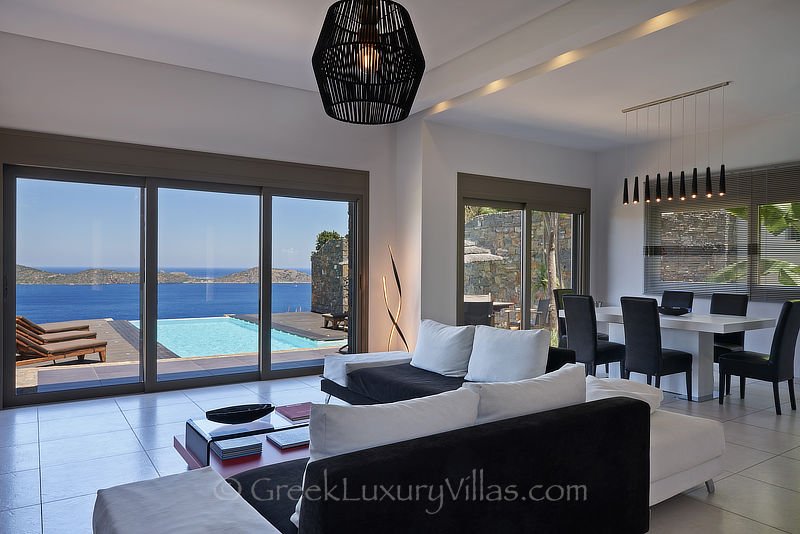 contemporary interior of luxury villa with stunning view elounda bay
