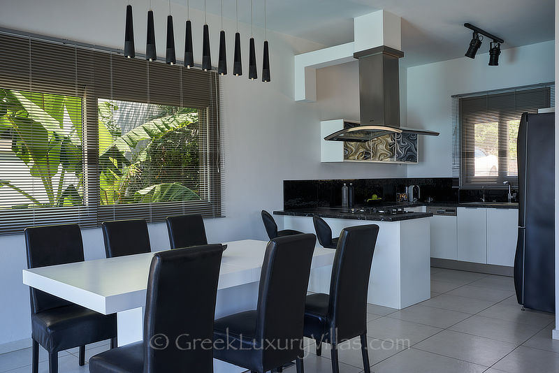 modern dining area of luxury villa in Elounda Crete