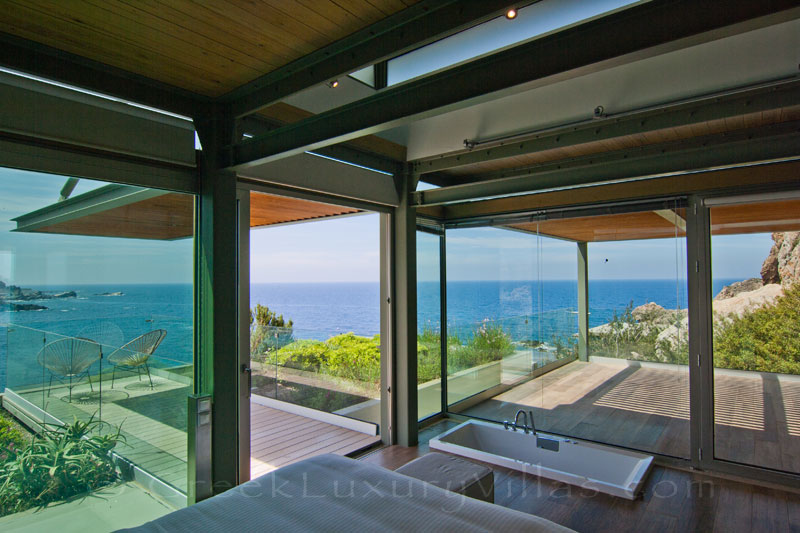modern seafront villa with pool and sea view from bedroom on Crete