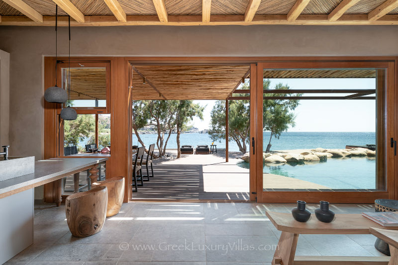 modern beach house with two bedrooms and pool views over the sea