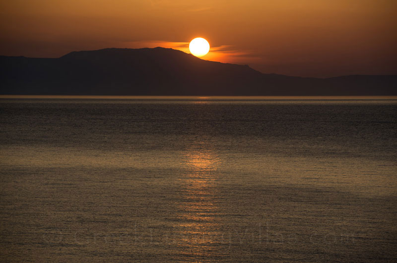 The view of the modern luxury villa in Crete at sunset