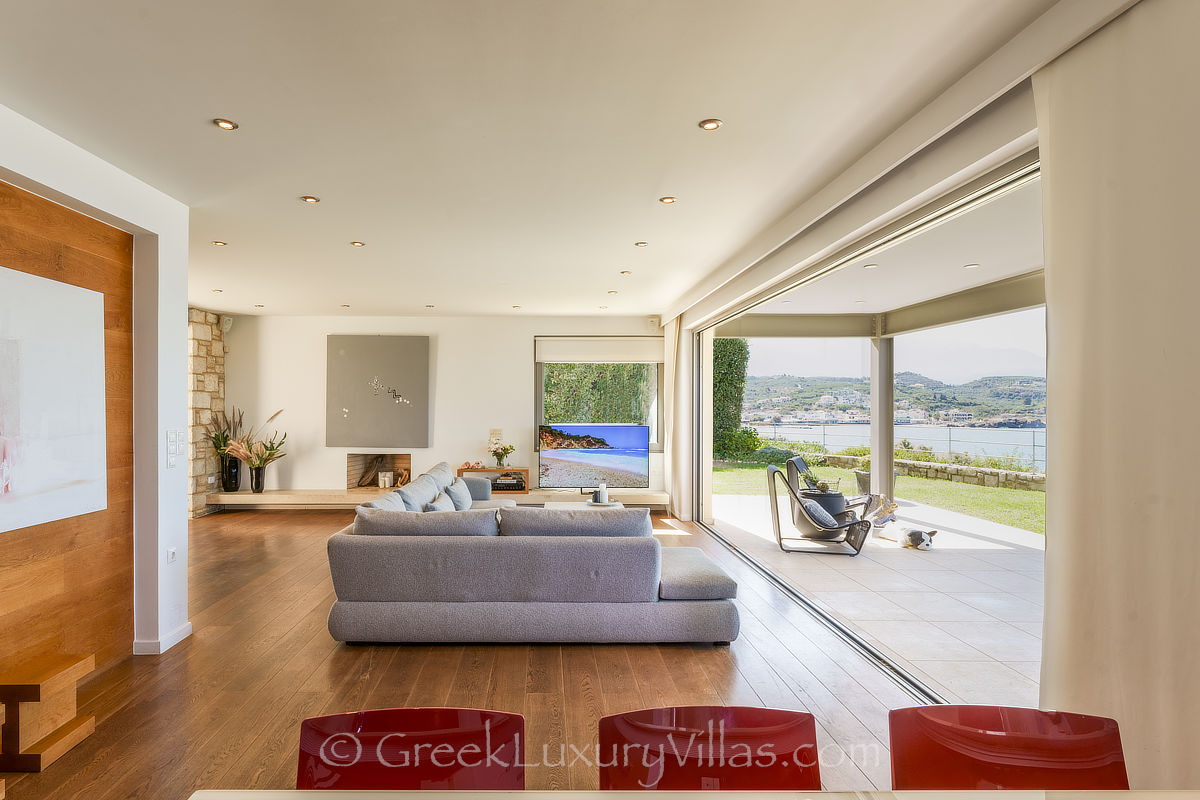 Lounge with sea view of modern seafront villa in Crete
