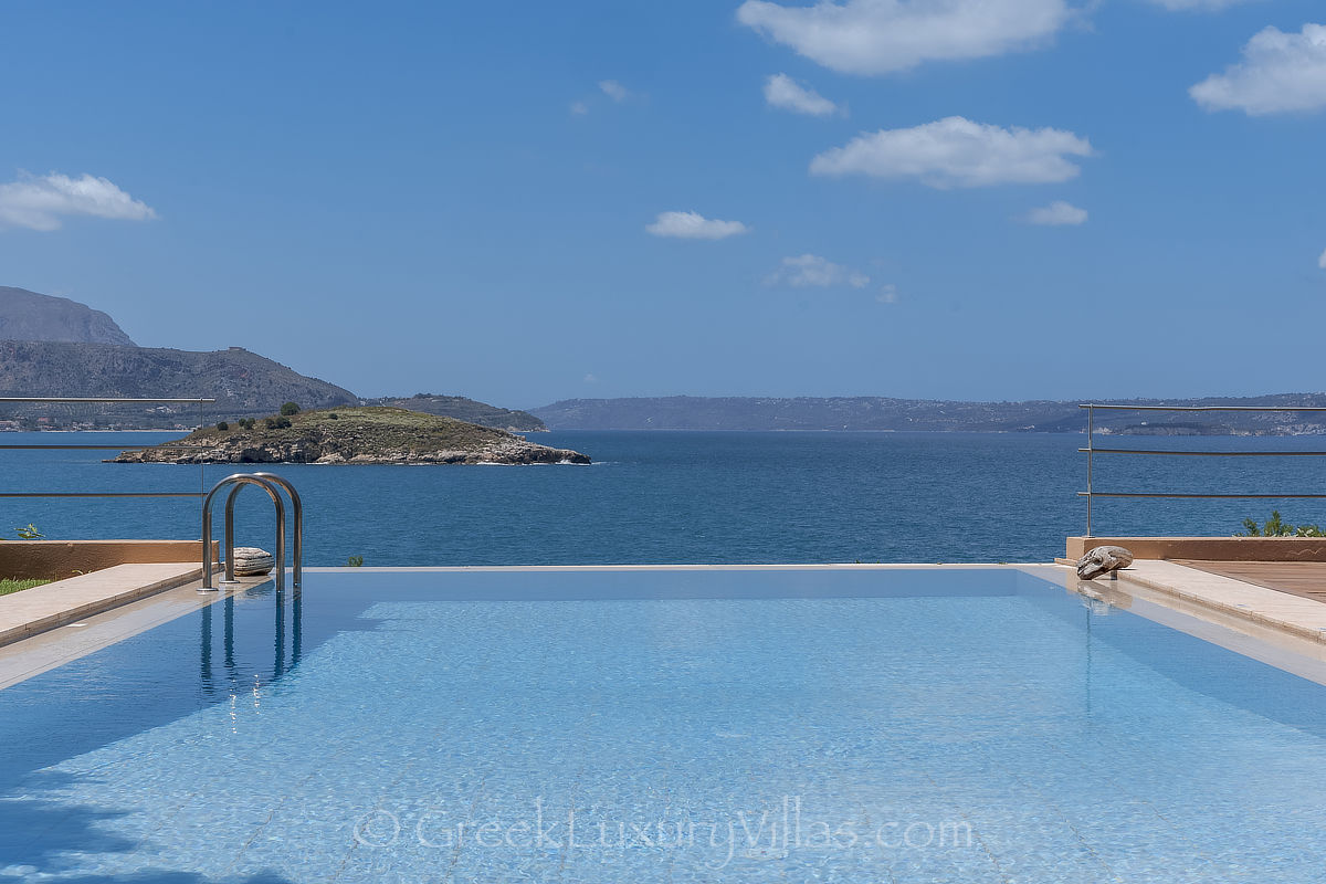 sea view from infinity pool at traditional seafront villa