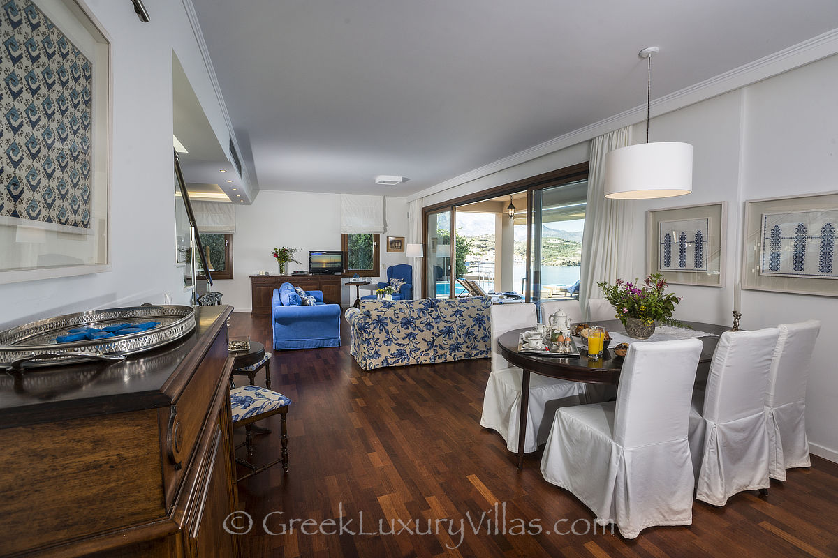 traditional interior of seafront villa with pool in Crete