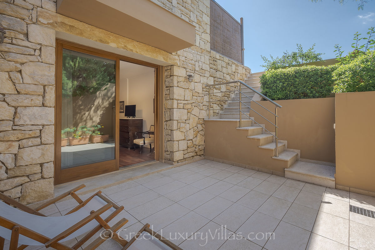 courtyard of traditional seafront villa with pool in Crete