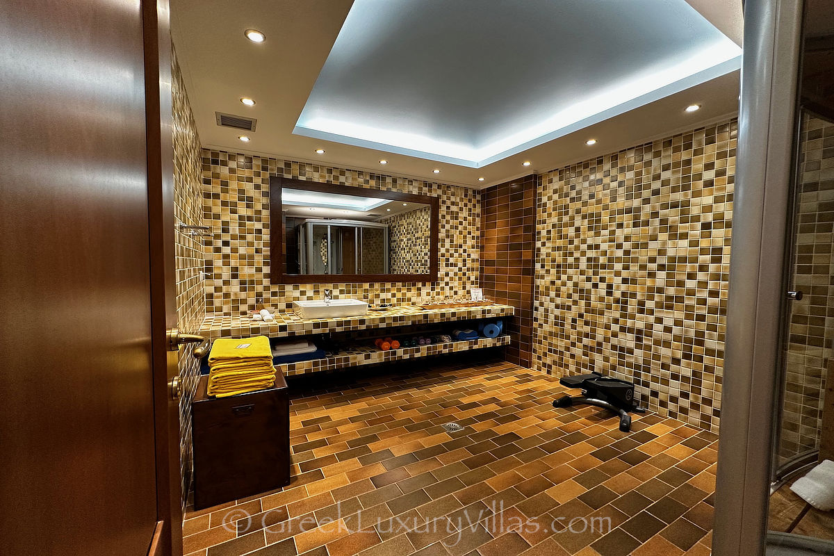 spa bathroom of traditional seafront villa with pool