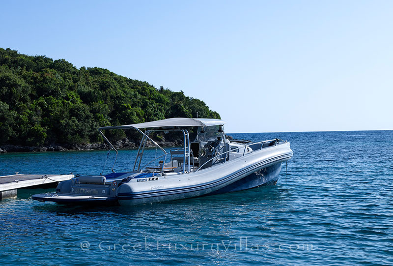 Speed boat of the luxury villa with a heated pool in Sivota