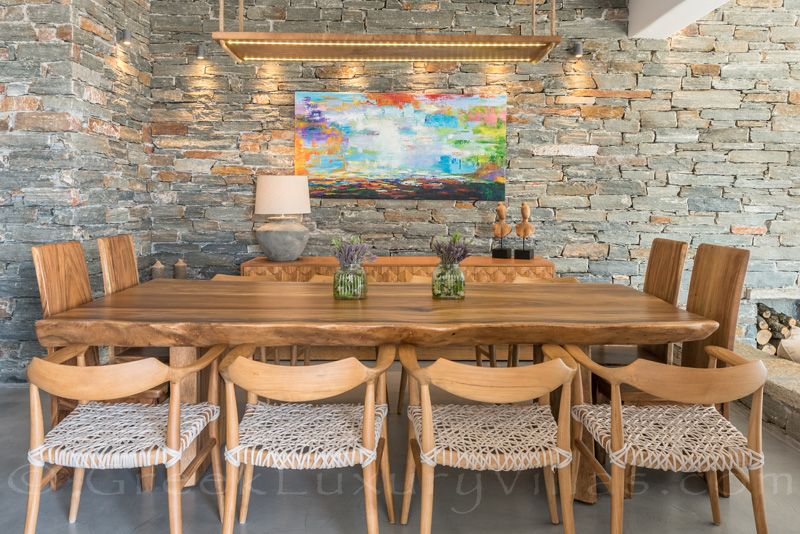Dining table of luxury villa with pool in Kea