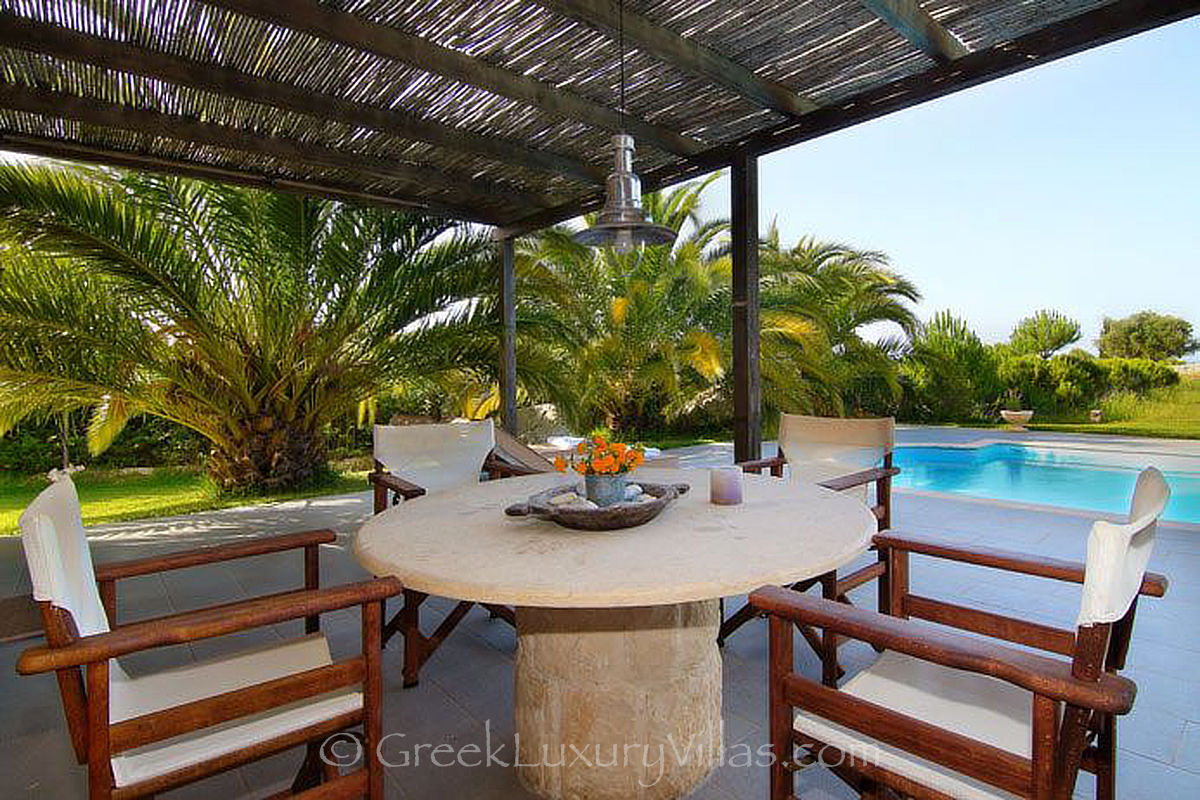 outdoor dining two bedroom villa with pool