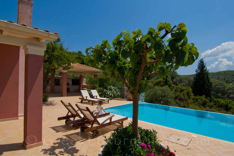 Outdoor dining area and bbq of villa with seaview in Lefkada