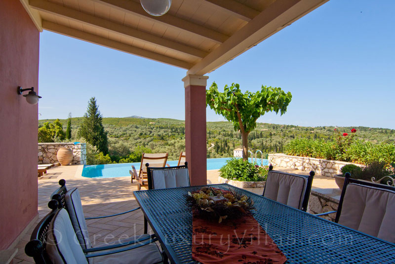 Outdoor dining in villa with pool and seaview on Lefkas