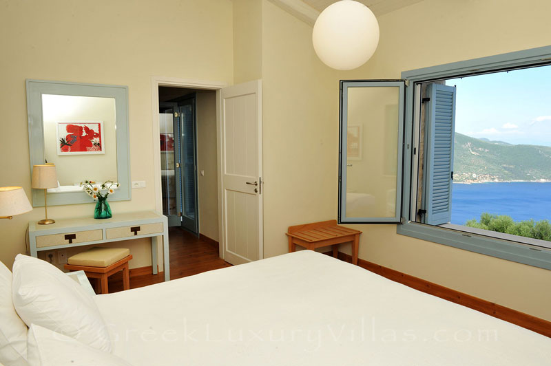 A bedroom in a luxury villa with a pool in Lefkada that sleeps six people
