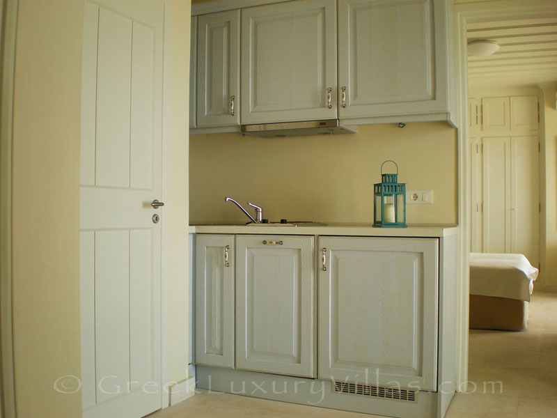 A kitchenette in a villa with seaview and a pool in Lefkas