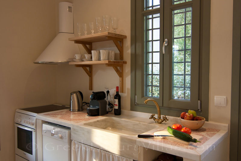 Open plan kitchen in the villa with a pool in Lefkada