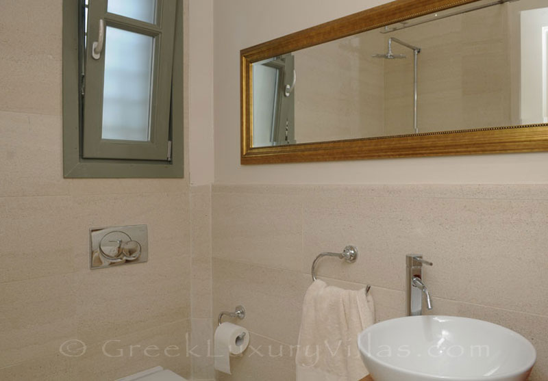 The bathroom of a villa with a pool in Lefkas