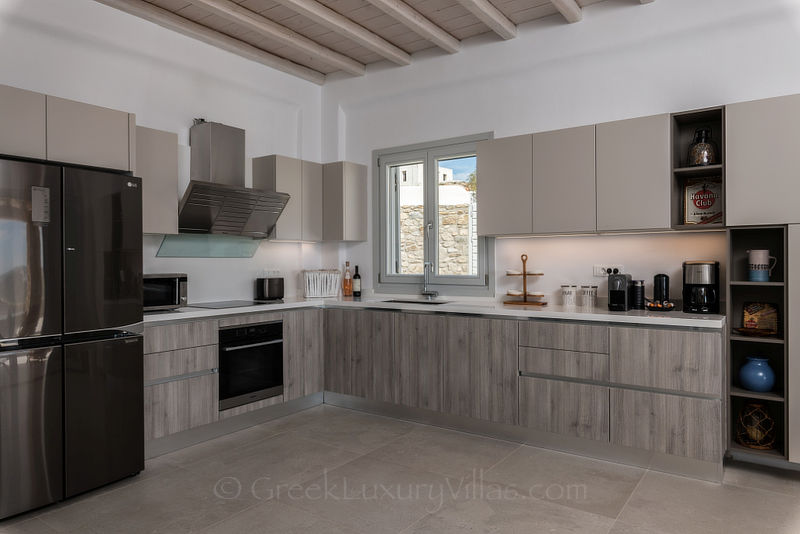Modern kitchen of villa with pool in Mykonos