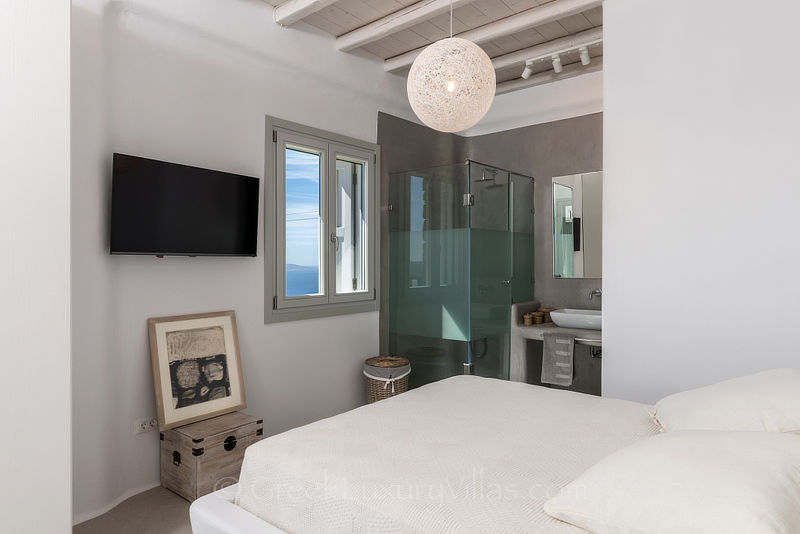 Guestroom of villa with pool at Agios Stefanos Beach