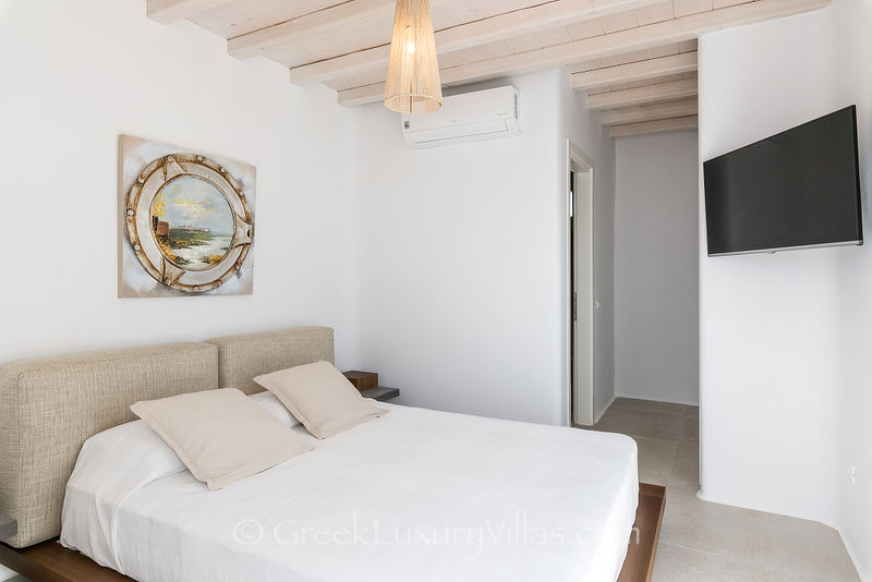 Guest bedroom of villa in Agios Stefanos Mykonos