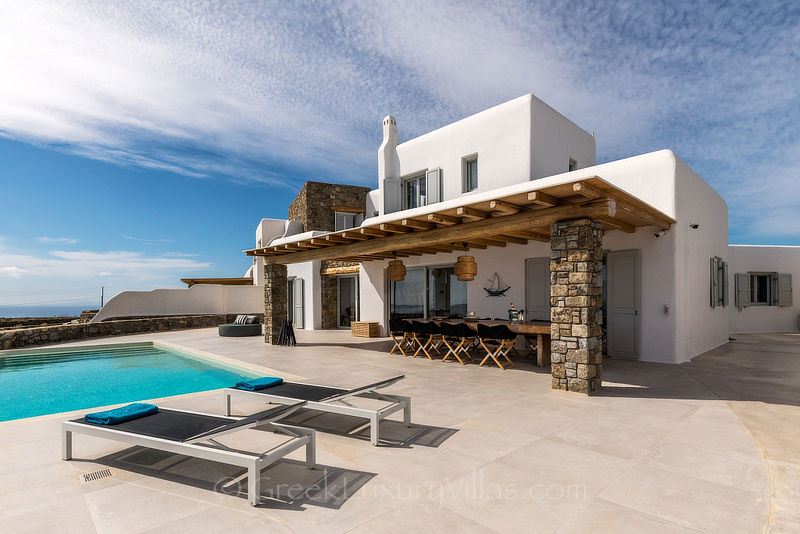 Pool area of modern luxury villa near Agios Stefanos