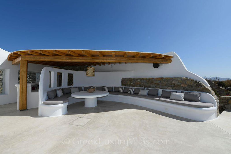 Stylish outdoor lounge typical for Mykonos at villa in Agios Stefanos