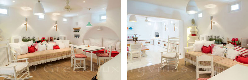A lounge downstairs in a luxury villa with a pool in Naxos