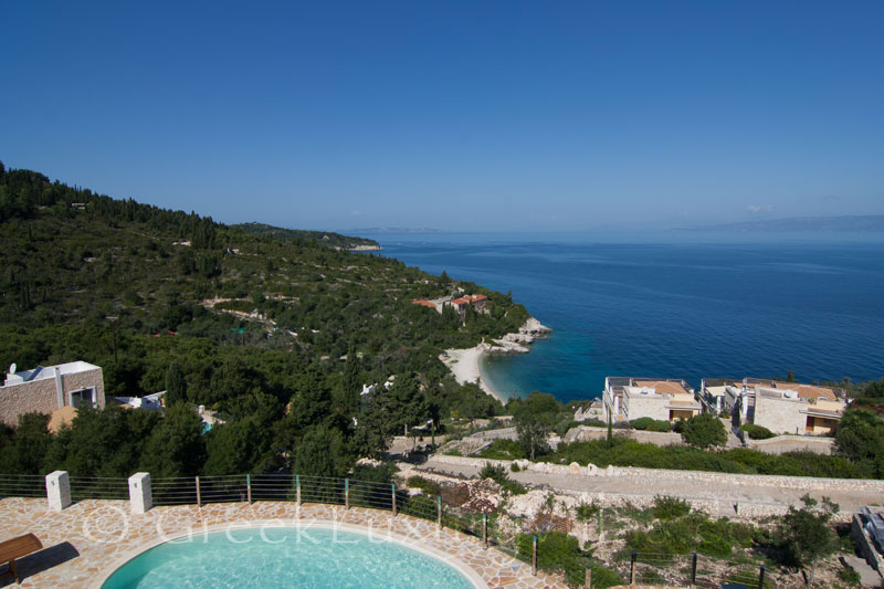 Seaview from the bed of a villa with a pool in Paxos