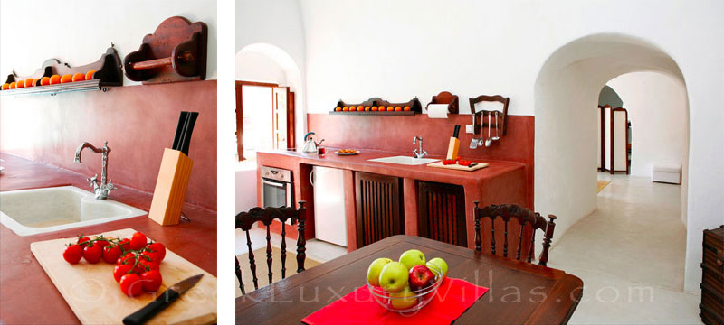 The kitchen of a traditional village house with a pool in Santorini