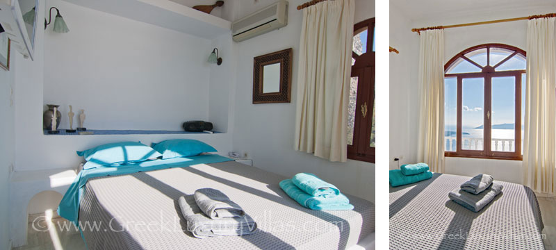 Seaview from the bedroom in a large villa with a pool in Santorini