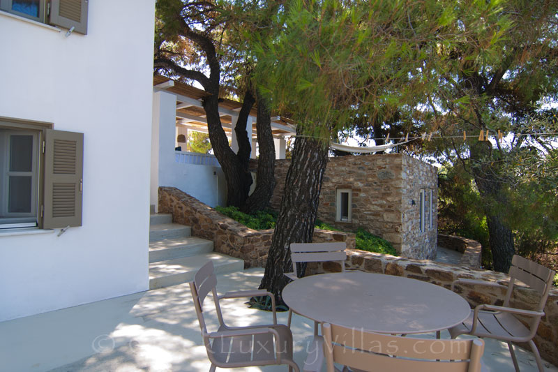 garden table guest bedroom waterfront villa Skiathos