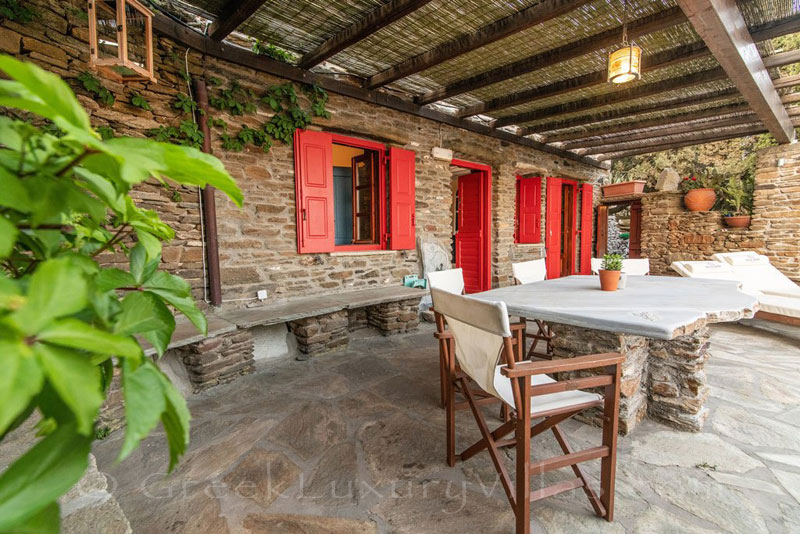 Tinos villa terrace with sunset sea view