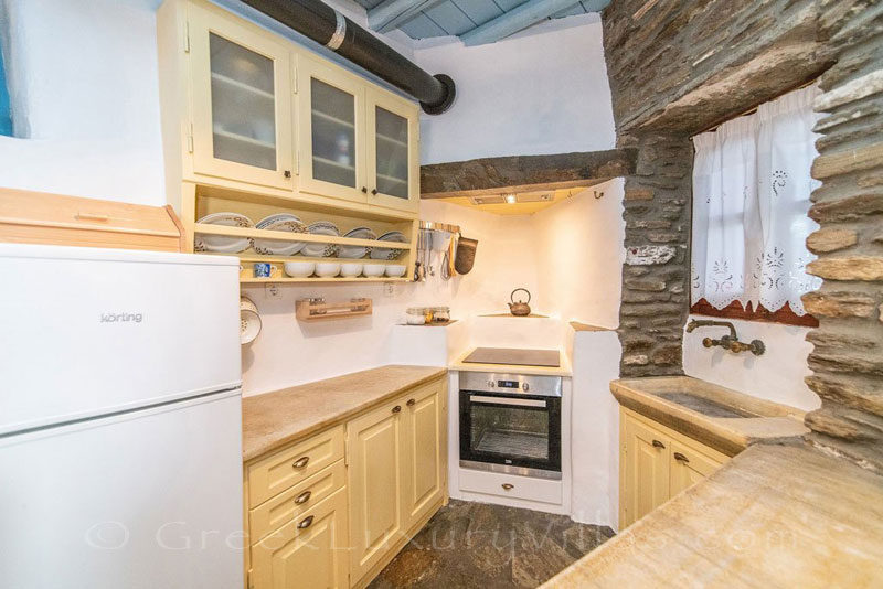 Tinos traditional villa open plan kitchen