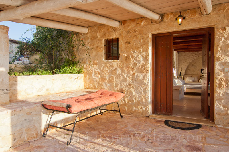 Another bedroom in a seafront villa with a pool in Zakynthos