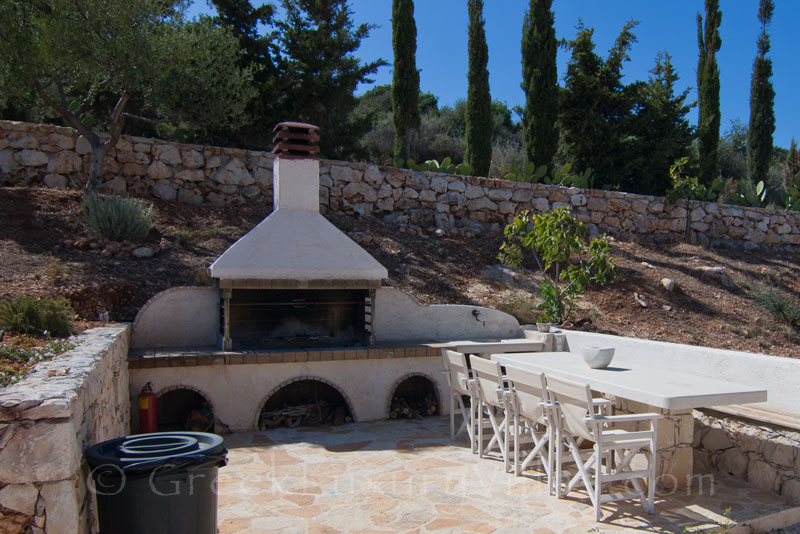 The BBQ of a seafront villa with a pool in Zakynthos